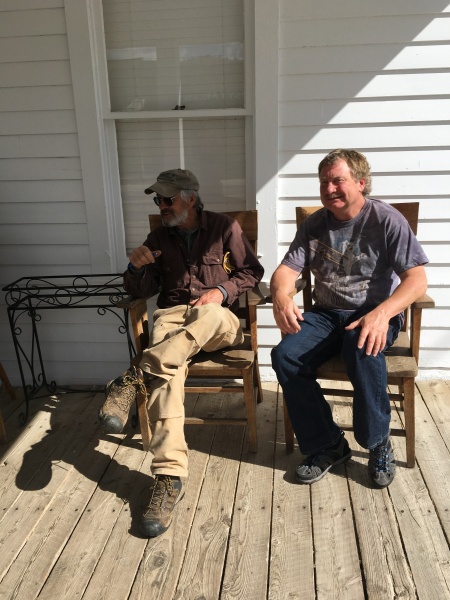 Roger and Eric chewing the fat on the front porch of Fairweather Inn